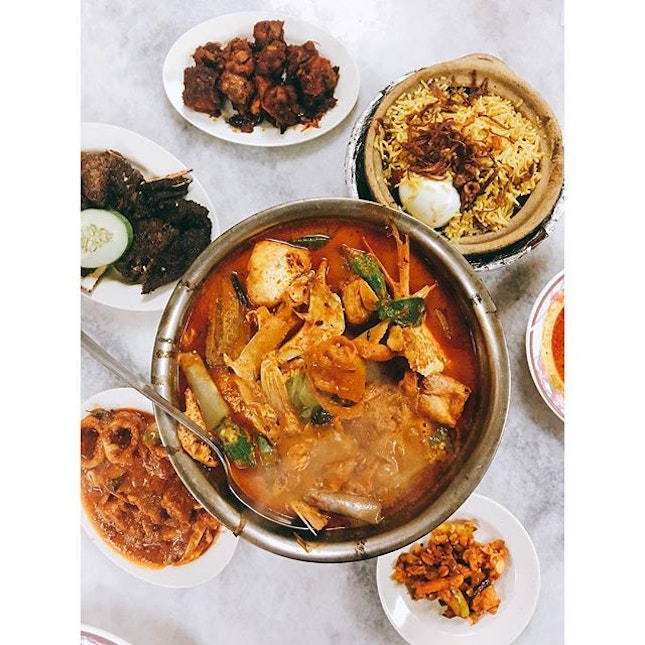Bubbling bowl of curry fish head for the wet season | All my fav dishes - grilled lamb, sambal squid & lamb biryani 😍

#burpple