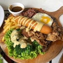 The wooden serving board made the combo mixed grill looks way better.