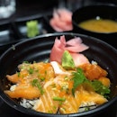 Salmon don which came with cubes of marinated salmon and served with miso soup and a side salad for only 12 nett.