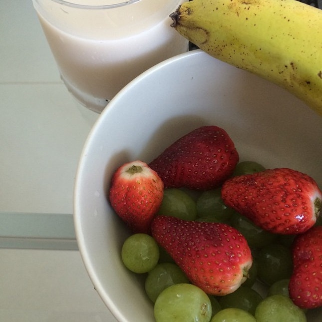 #breakfast grapes, strawberries, banana, Pure Harvest organic rice milk