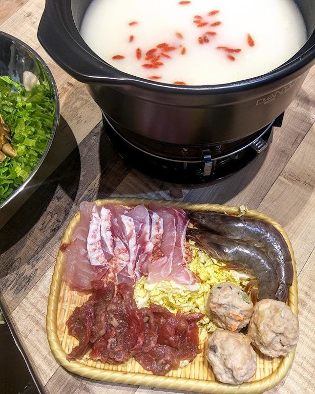 [Empress Porridge] - The Porridge Steamboat ($15) comes with a finely milled porridge base, along with an assortment of protein and vegetables.