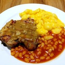 Char-Grilled Chicken with BBQ Beans + Mac & Cheese as sides.